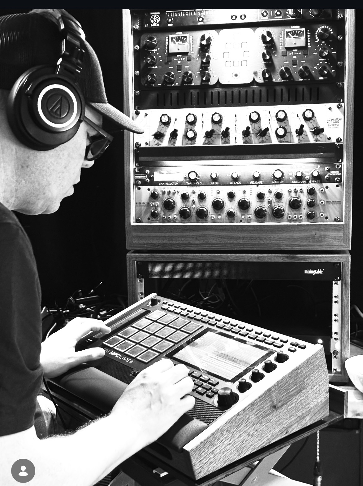 Sabrehart performing with a sampler and studio equipment